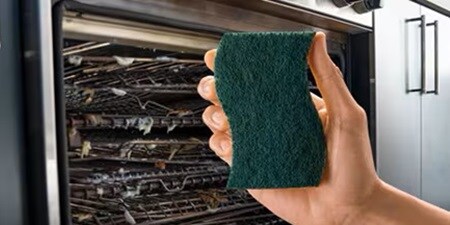 a Heavy Duty Scrub Sponge that can be used to properly clean an oven
