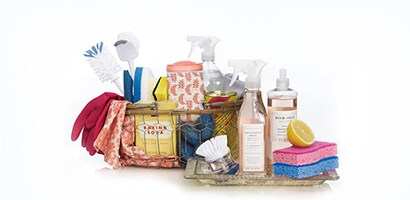 Basket of kitchen cleaning supplies
