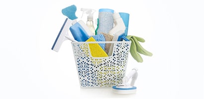 Basket of bathroom cleaning supplies
