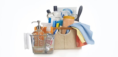 Basket of laundry cleaning supplies
